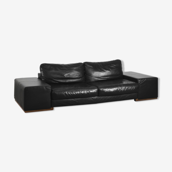 Modernist elegant black leather italian sofa with modules by natuzzi