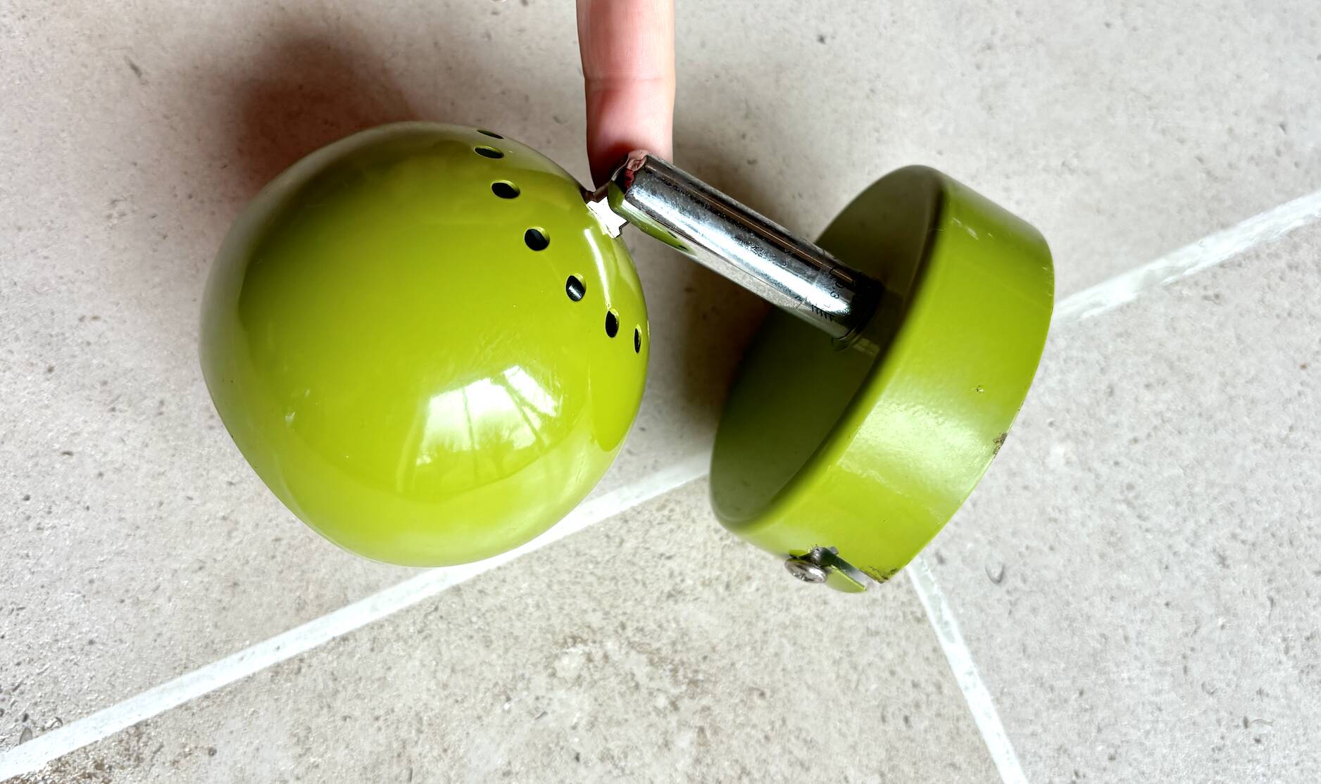 Small vintage metal spotlight in anis green/khaki color.