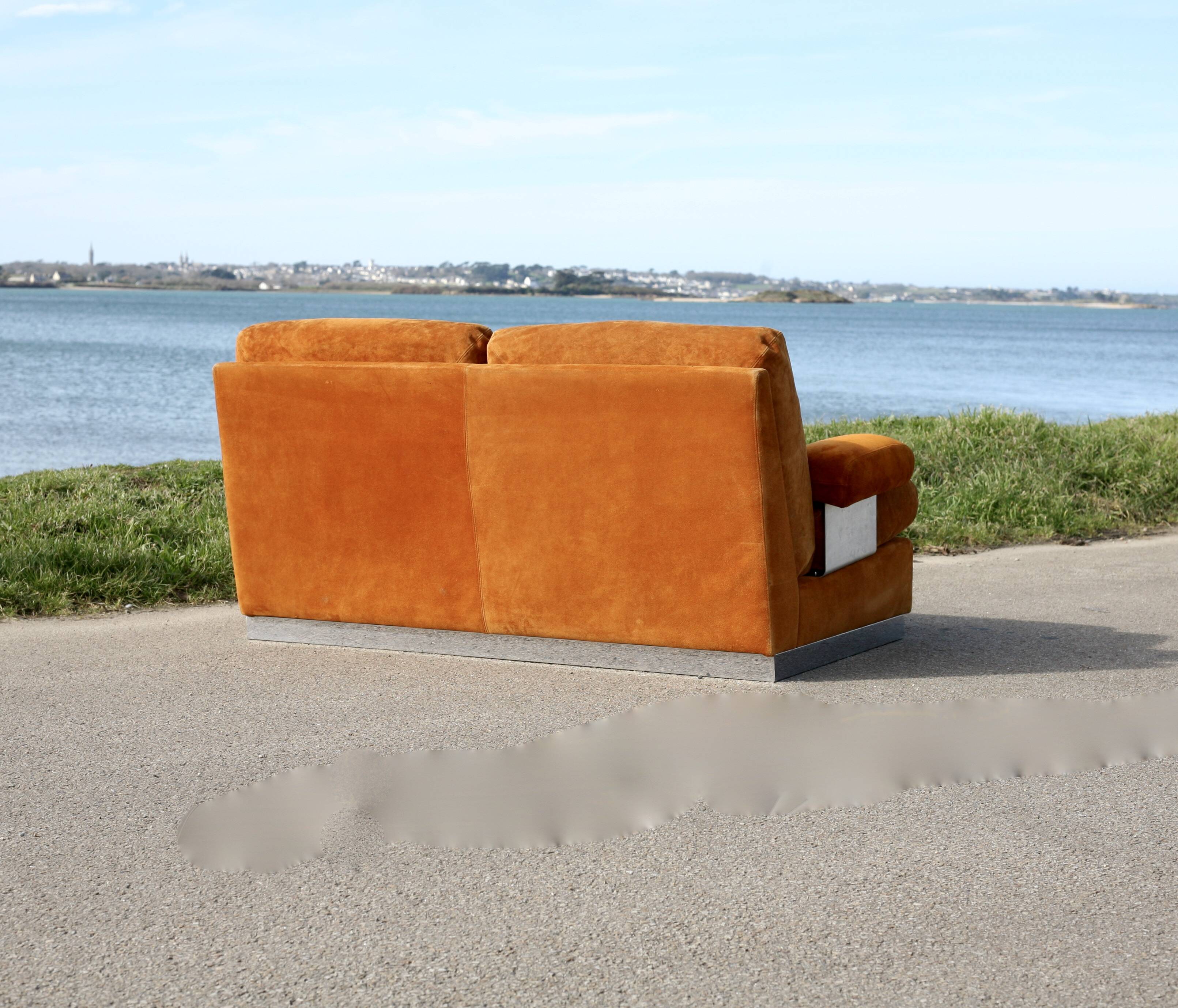 Orange suede leather and steel sofa. Circa 1970