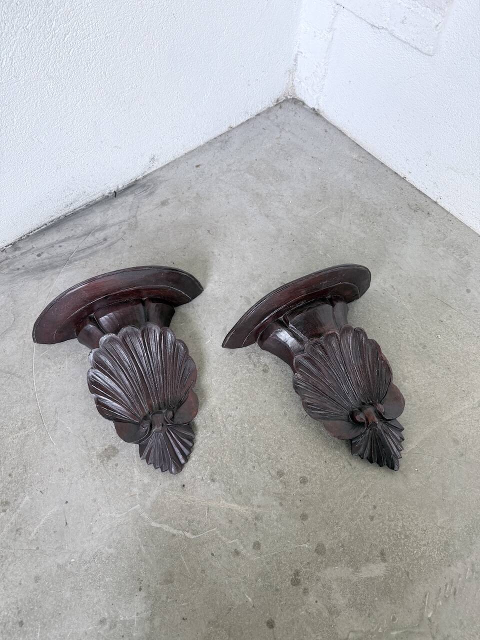 Pair of carved Italian wall consoles