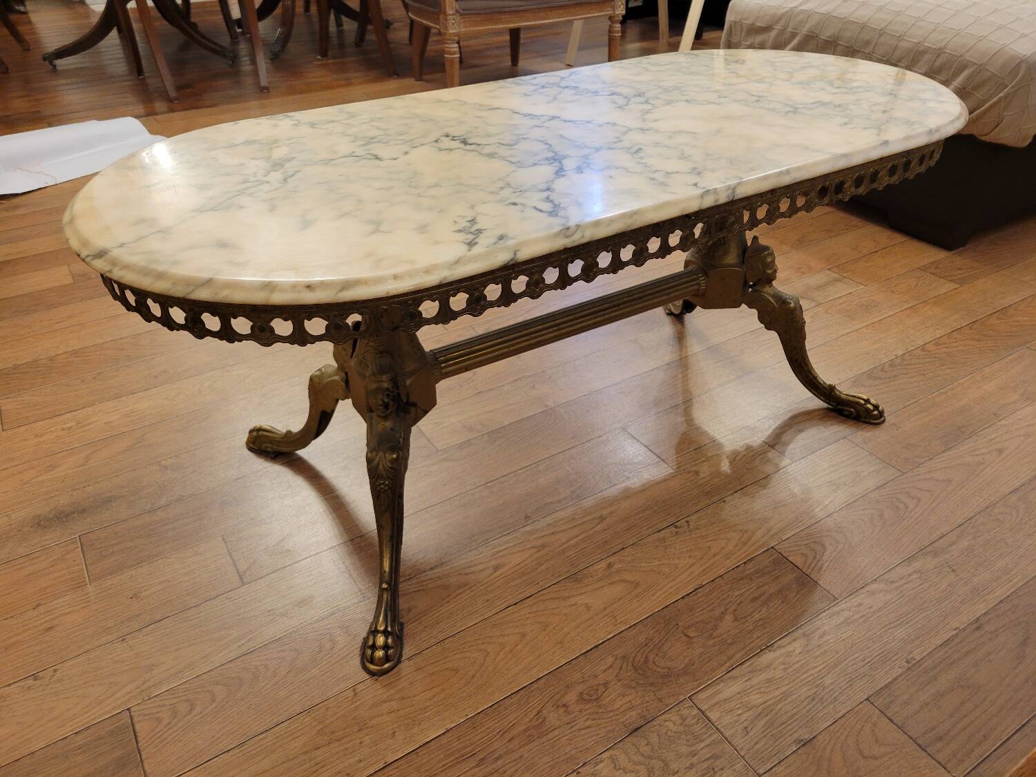 Coffee table in gilded bronze and marble