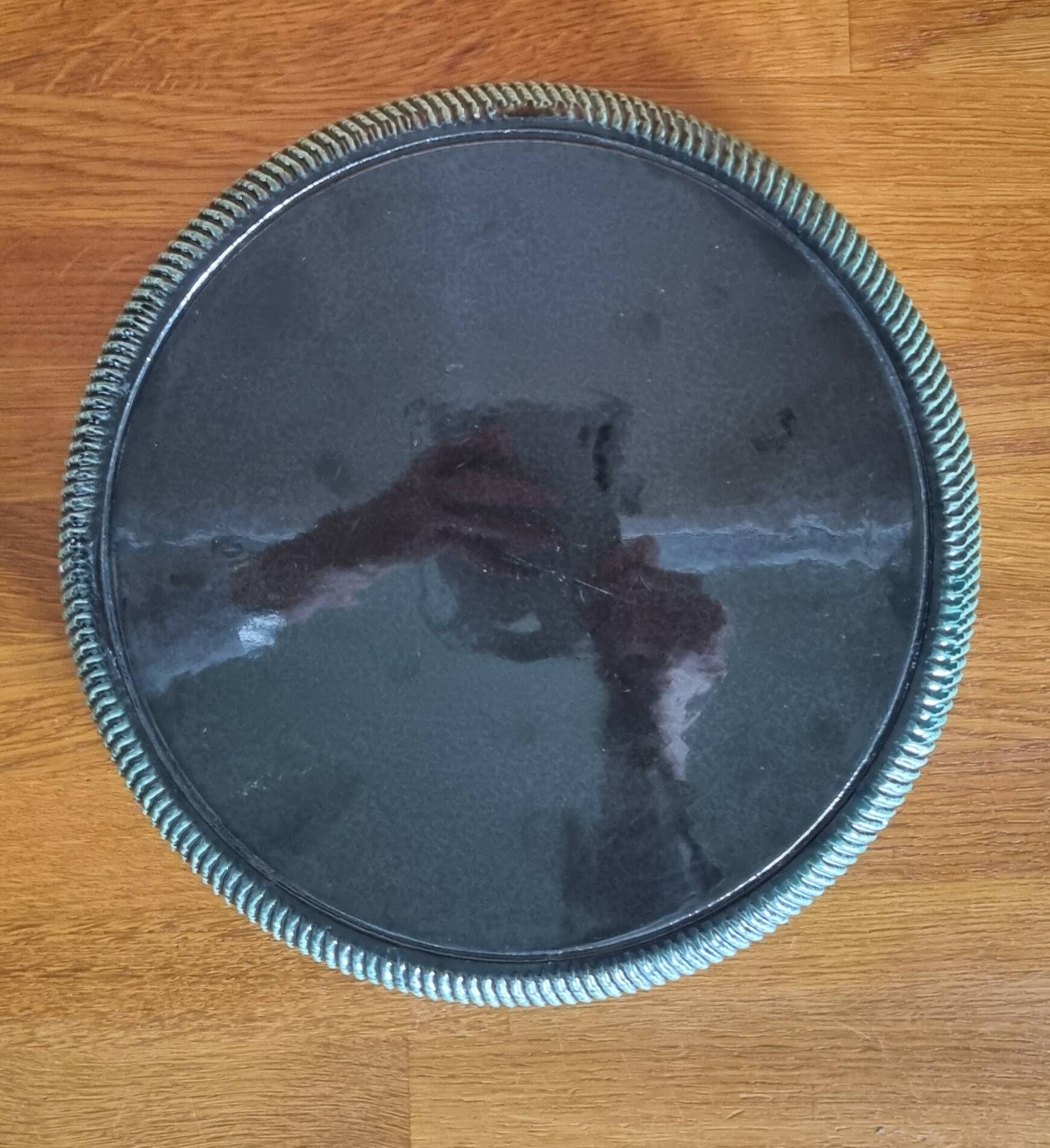 Dessous de plat vintage en céramique noire et verte