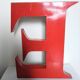 Red metal sign letter "E"