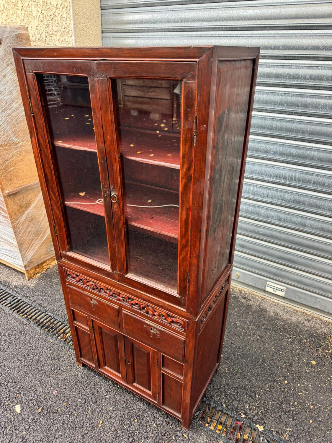 Attractive two-part Indochinese display cabinet. Mid-20th century