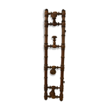 Wooden coat rack with swivel hooks