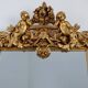 French rococo style richly sculpted gilted oak mirror, 19th century