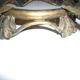 Ceramic plate underside on bronze stand