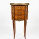 Oval bedside table in Louis XV style with marquetry.