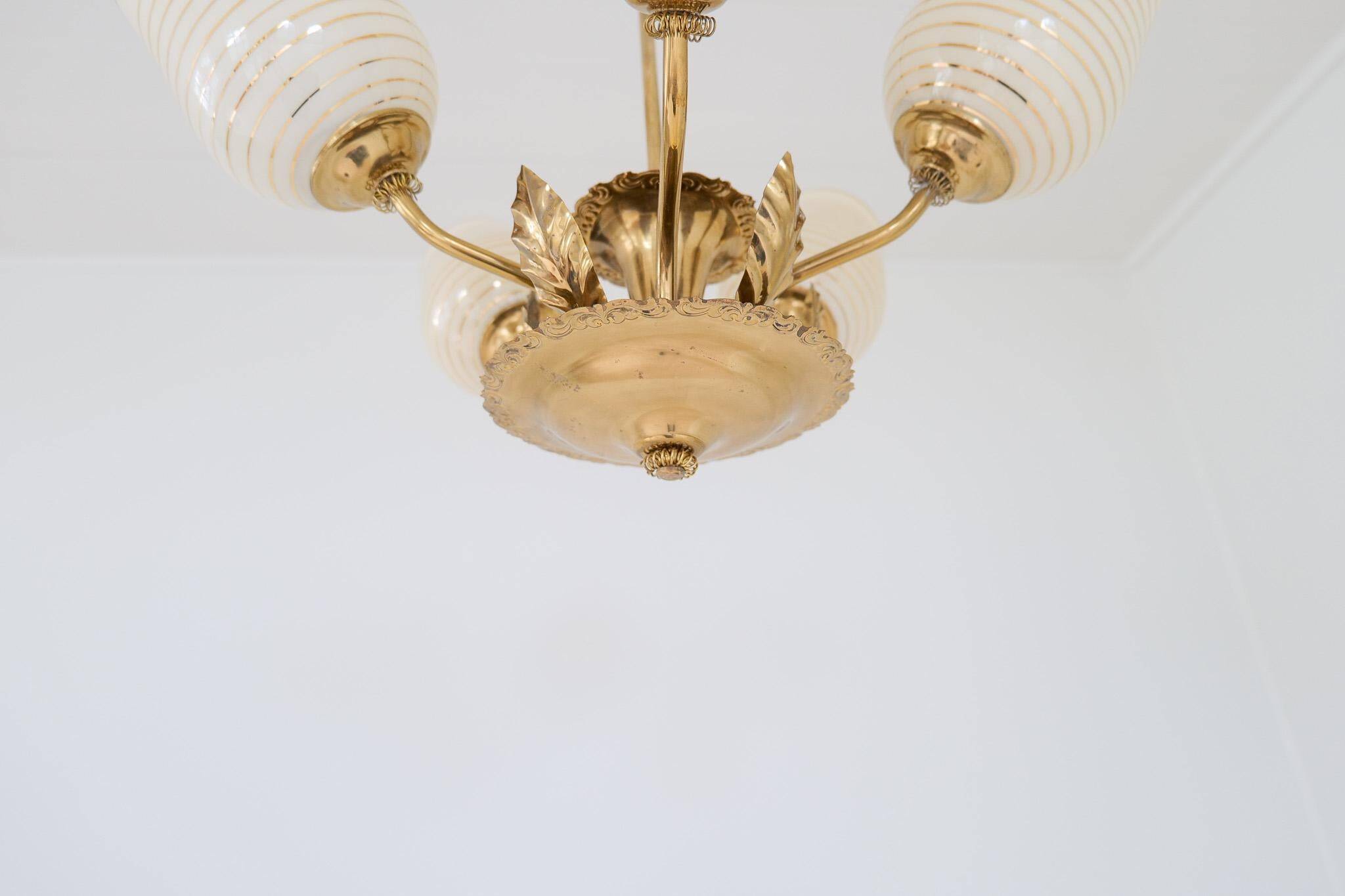 Mid-century brass and glass pendant light by Sario, Finland, 1950s.