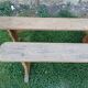 Pairs of large benches in raw fir wood.
