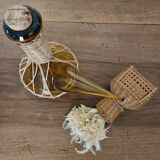 Catalan bottle in amber glass and wicker