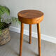 Tripod stool in a brutalist style