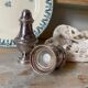 Silver-plated salt and pepper shakers, fluted, beaded decoration.