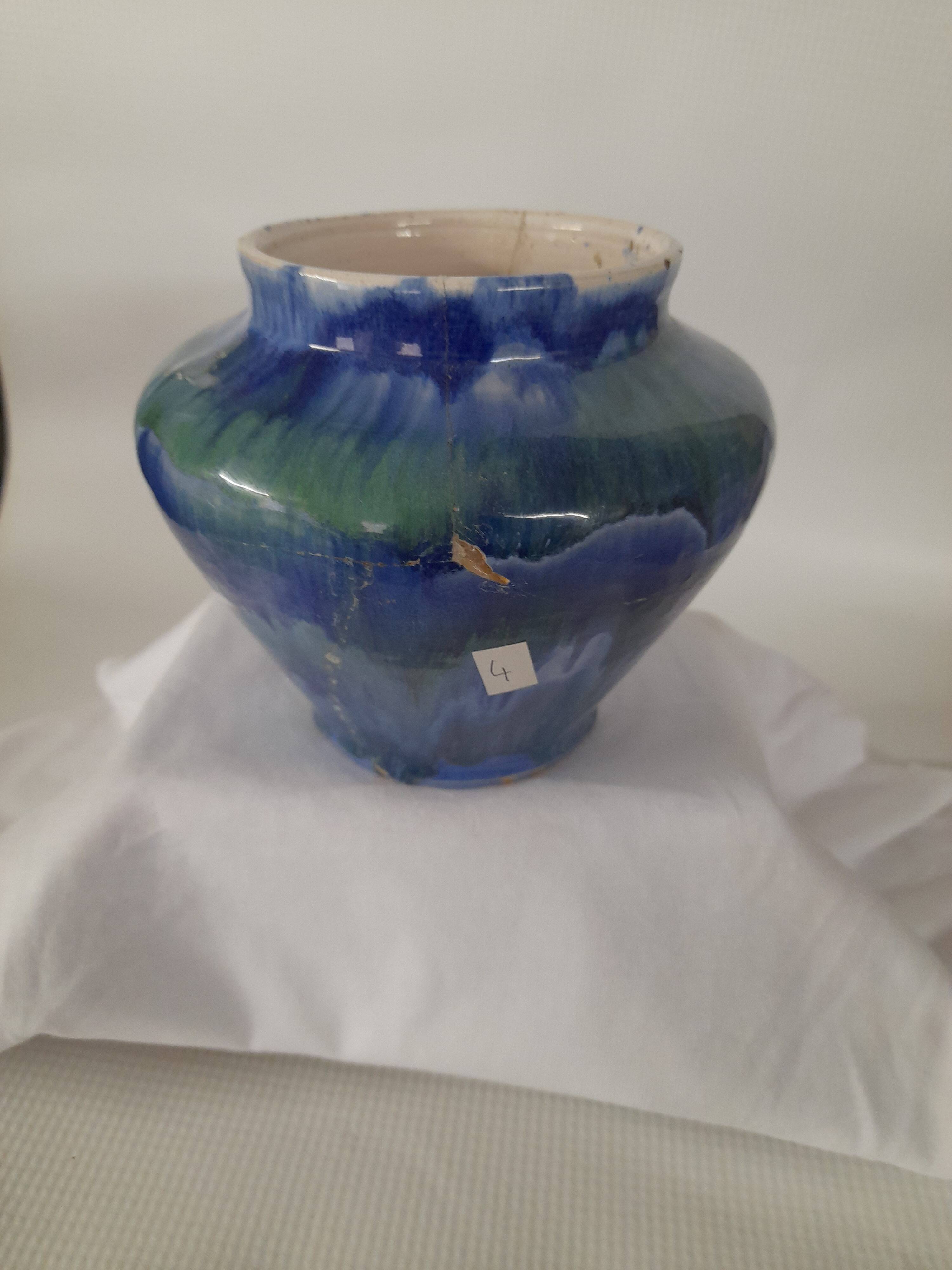 a blue flamed stoneware vase