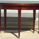 Half-moon console table, extendable in Empire style.