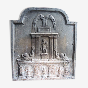 Old cast iron fireplace plate: neoclassical