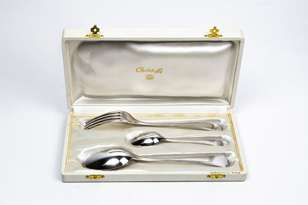 Three-piece birth set "America" — Christofle. 20th century.