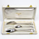 Three-piece birth set "America" — Christofle. 20th century.
