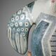 Vintage stylised mermaid ceramic wall sculpture from an art studio.