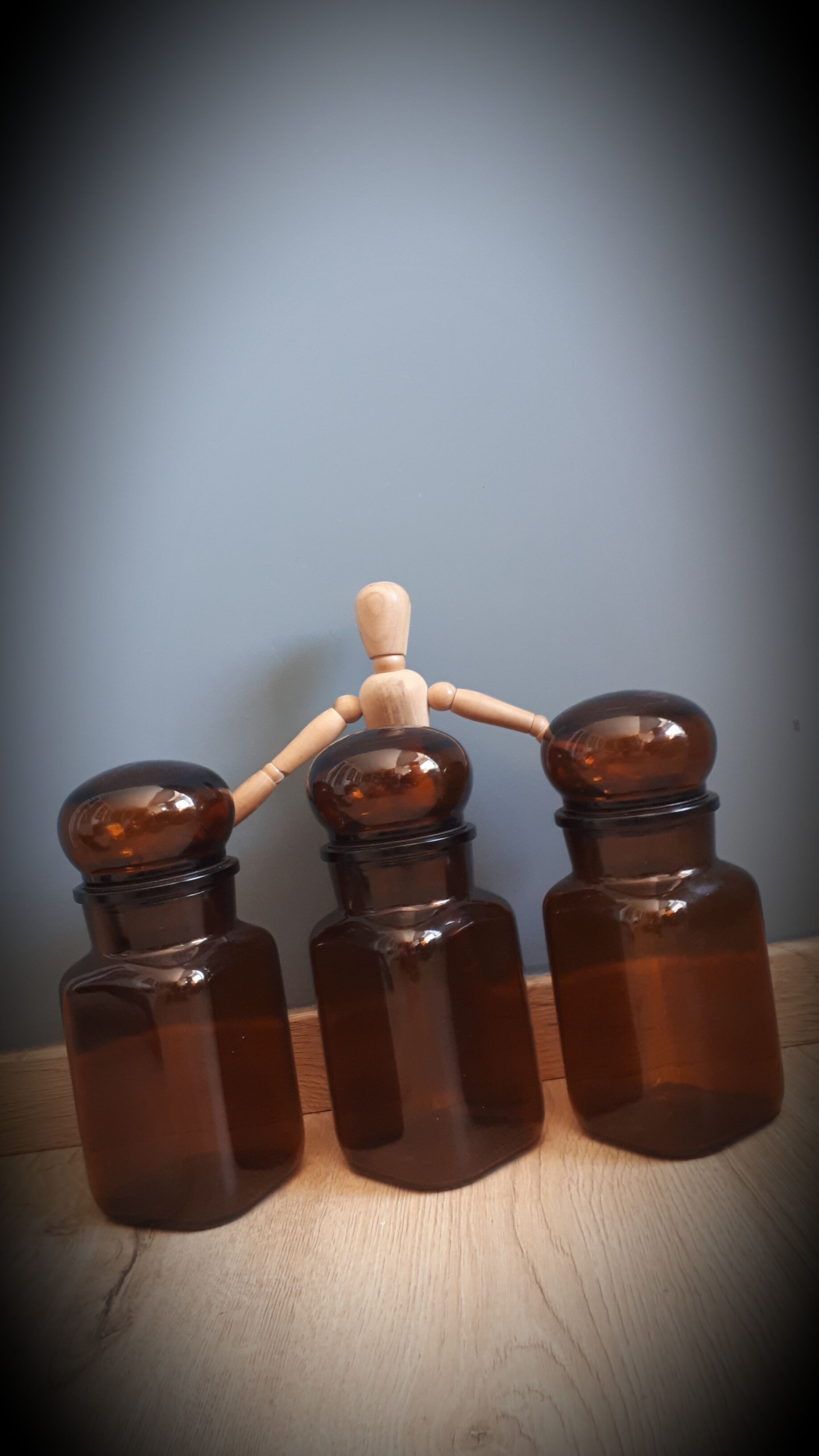 Trio round brown apothecary bottles