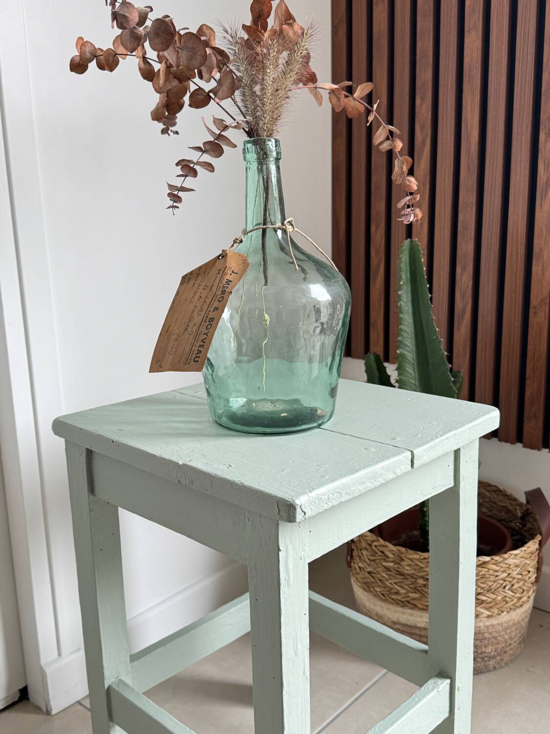 Antique almond green wooden stool