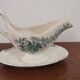 Gravy boat with white and green earthenware handle