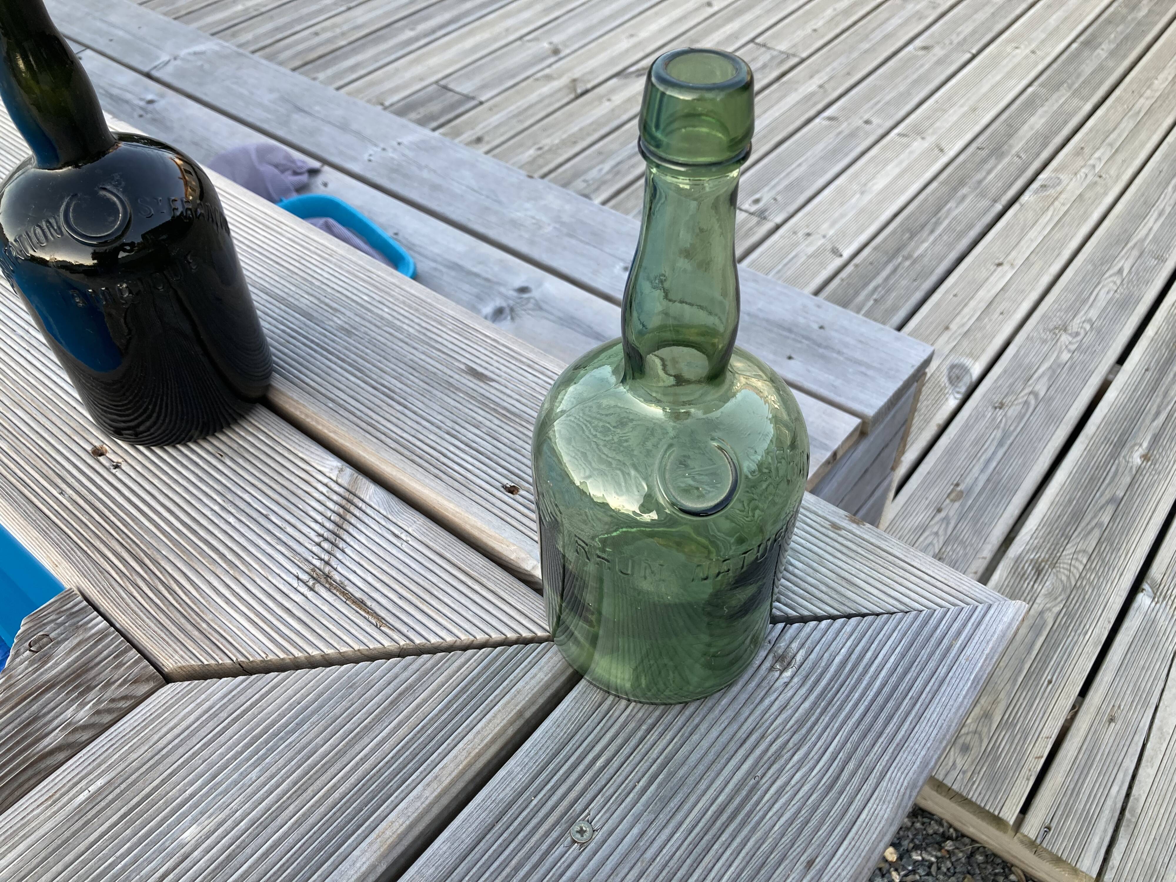 Set of three Vintage Rum Bottles