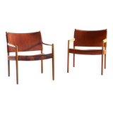 Pair of vintage Per-Olof Scotte "Premier 69" oak armchairs in cognac leather
