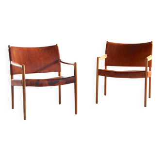 Pair of vintage Per-Olof Scotte "Premier 69" oak armchairs in cognac leather