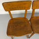 Set of 4 vintage solid oak chairs, 1960s design with sculpted backrest.