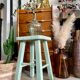 Old almond green wooden stool