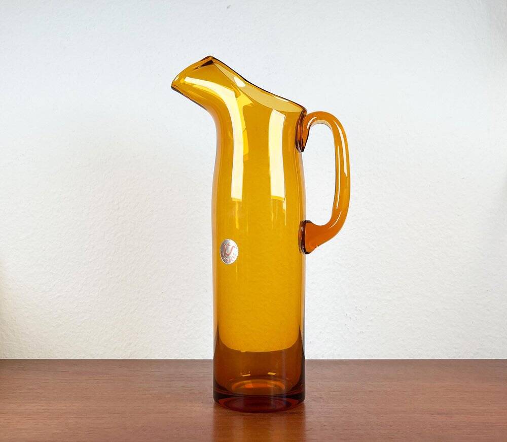 Amber glass carafe from the mid-century German Jagdhaus series and drinking glasses by Wilhelm Braun-Feldweg for Hirschberg, 1960s, set of 7.