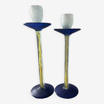 Duo of vintage Kosta Boda candlesticks in glass paste