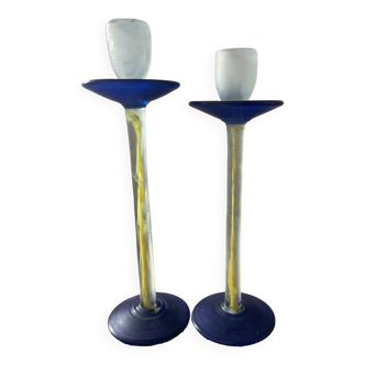 Duo of vintage Kosta Boda candlesticks in glass paste