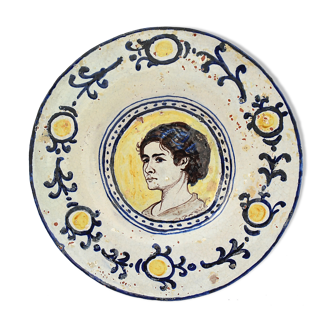 Earthenware dish with polychrome decoration of a portrait of a woman