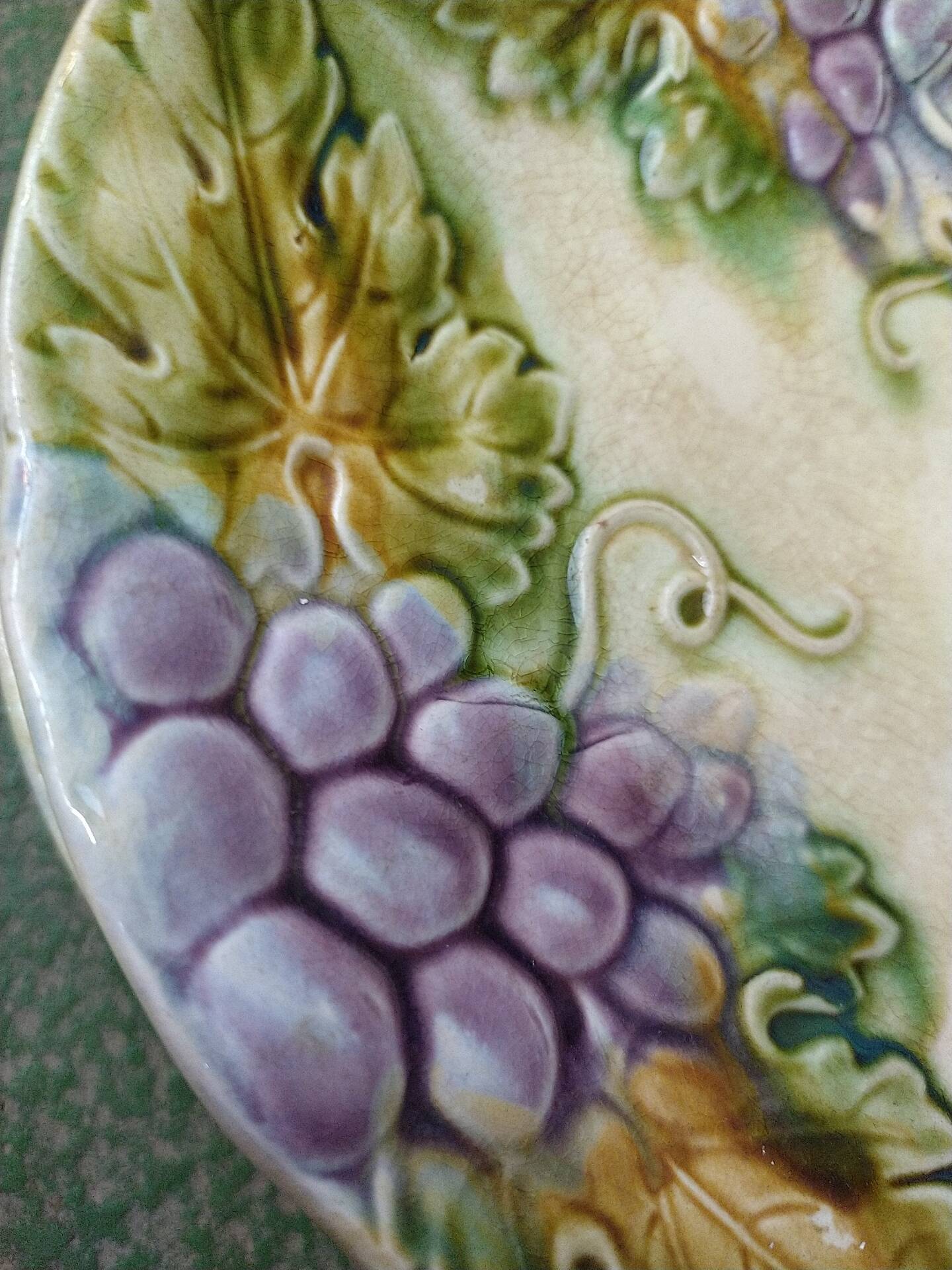 Slipware plates with vine decoration.