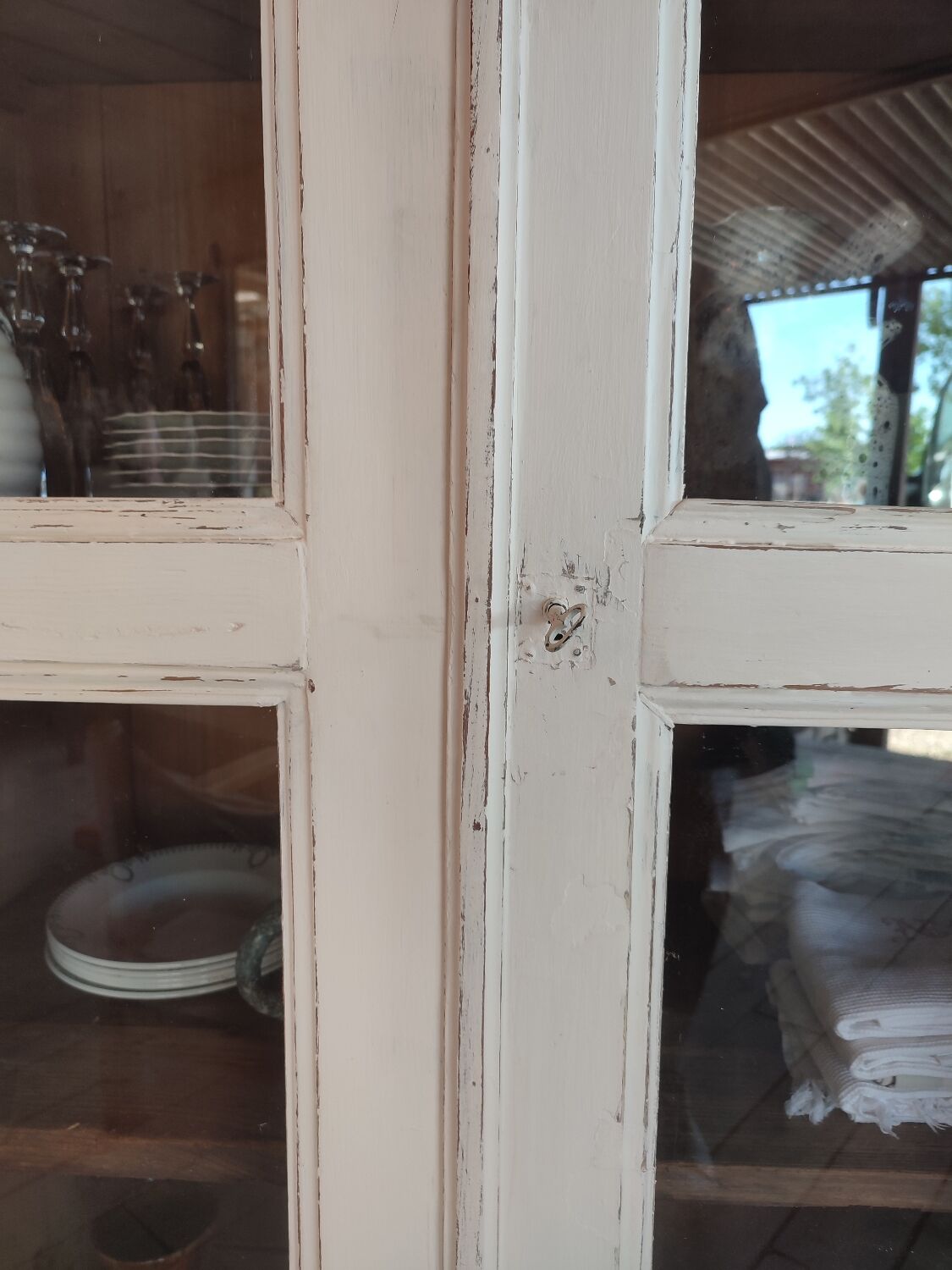 Patinated white bookcase