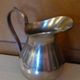 Coffee set in silver metal composed of 3 pitchers, Millan Freres, Paris
