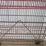 Metal display on wheels with 4 removable baskets 1960/70