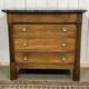 19th-century Empire commode in walnut with a grey St Anne marble top.