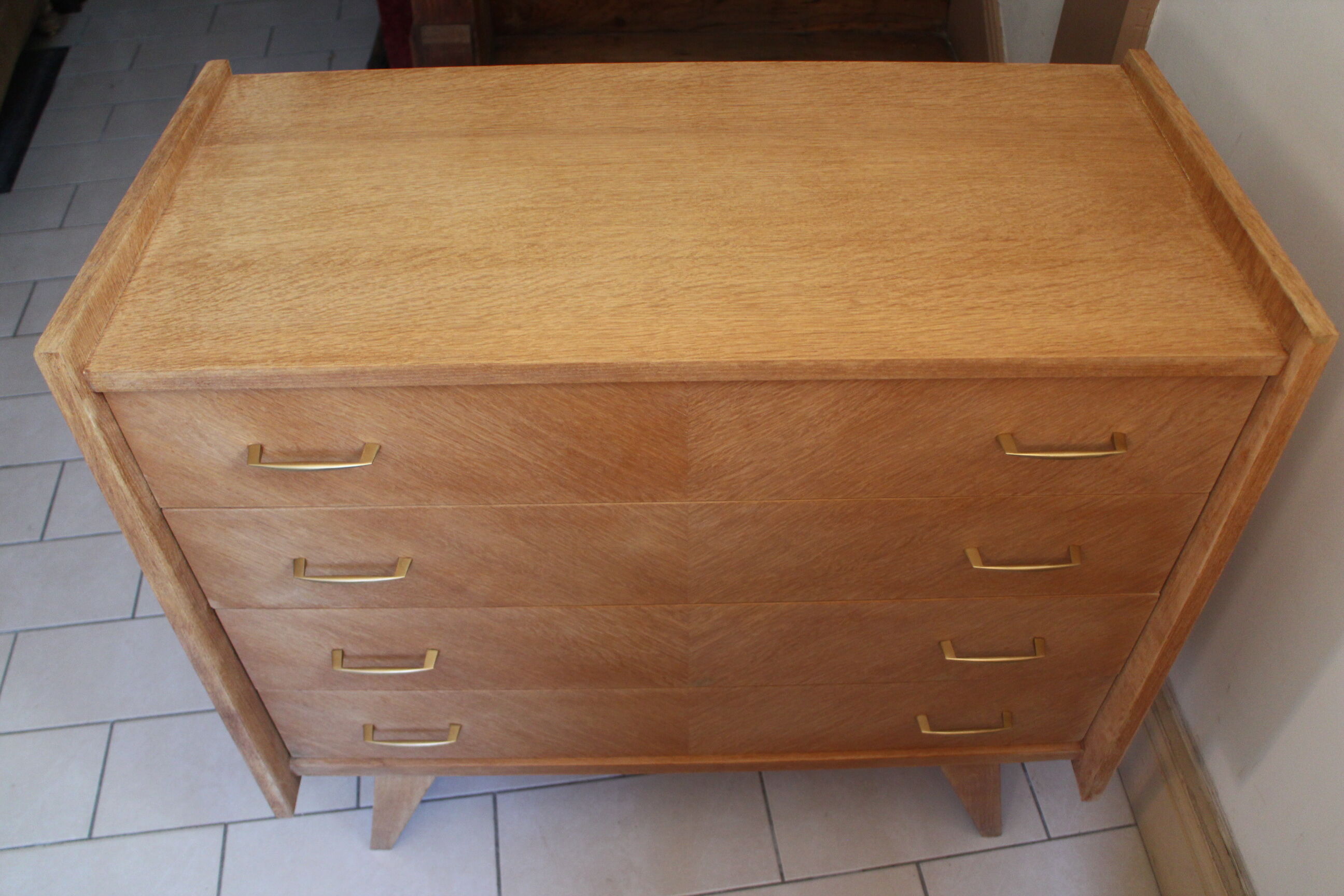 Chest of drawers with compass feet in raw wood