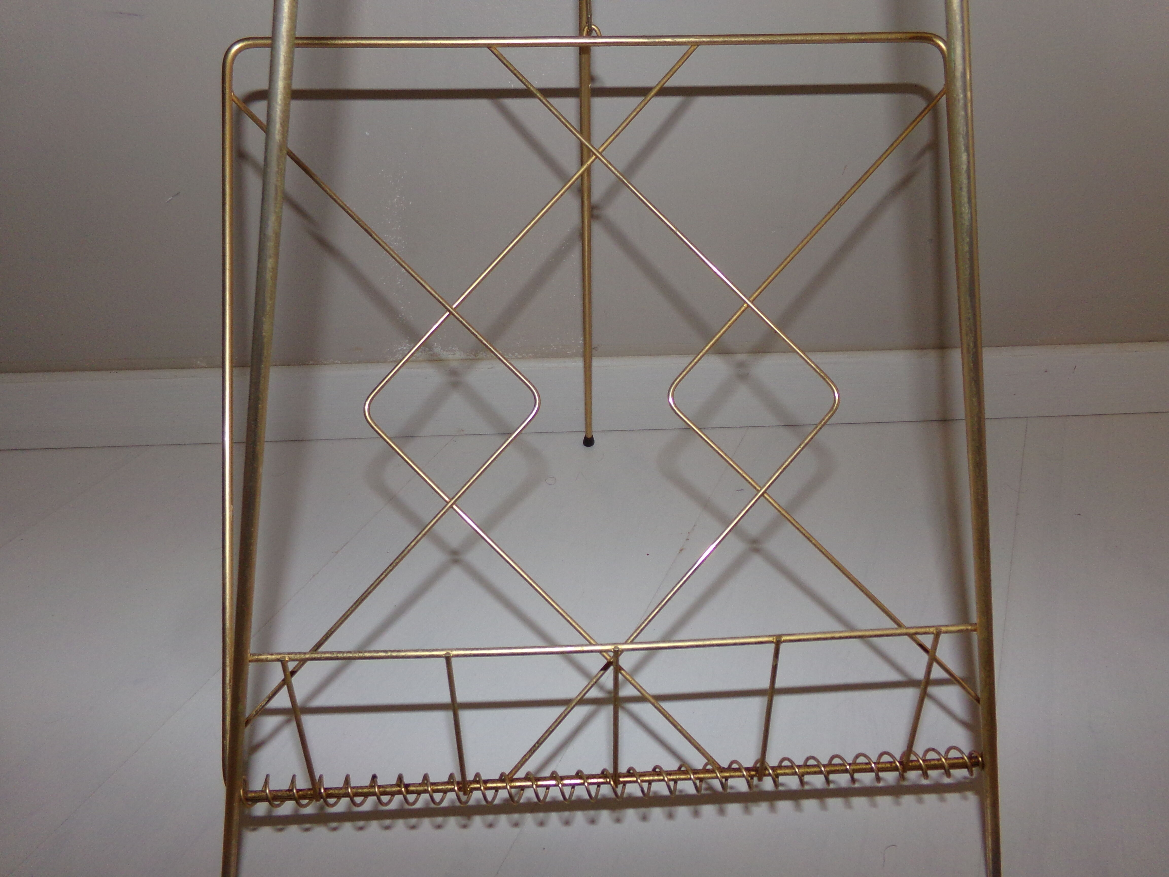 Vintage magazine holder in gold metal