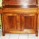 Sideboard with half-columns in walnut, Empire period.