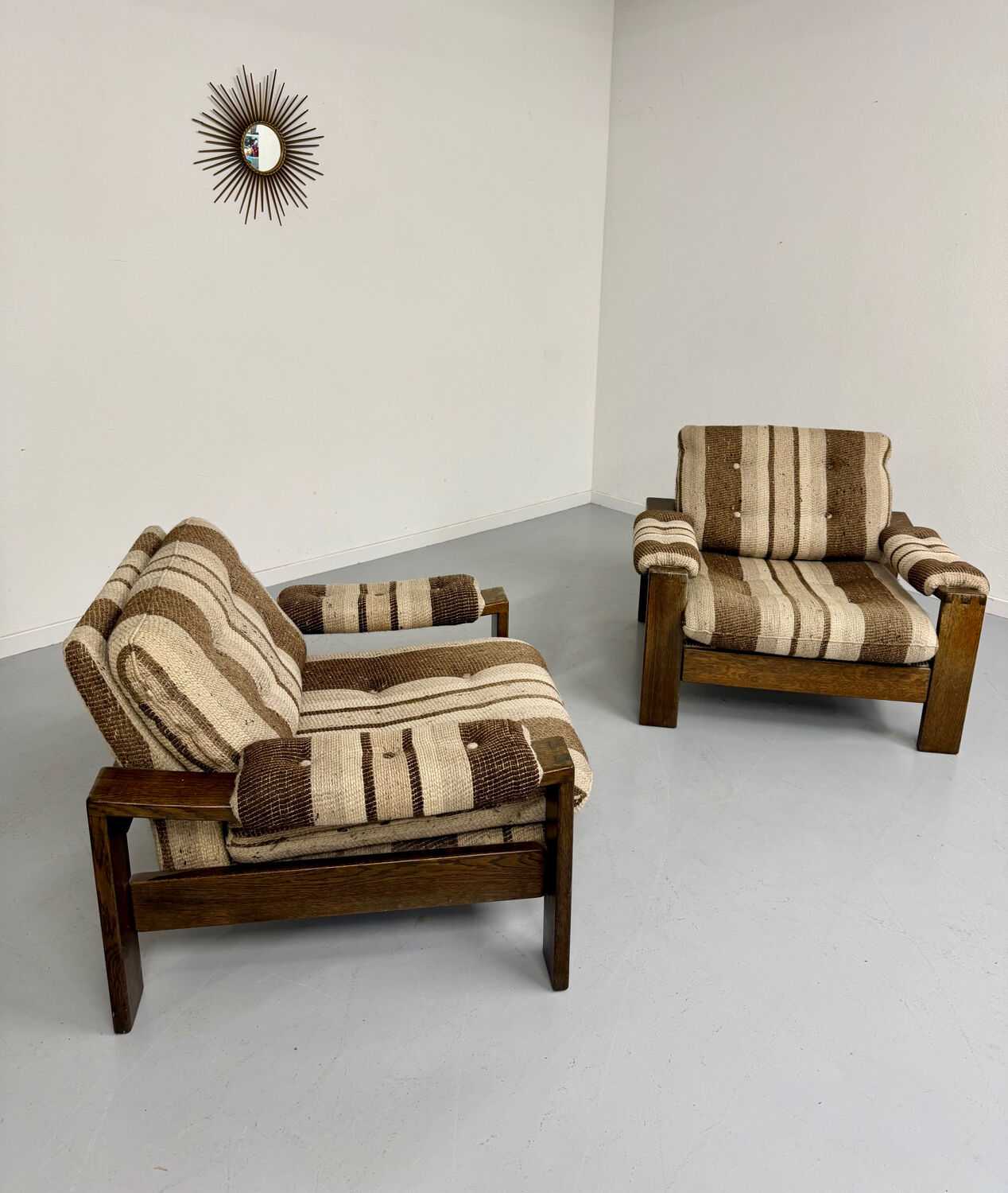 2 vintage 1970s wooden and fabric armchairs