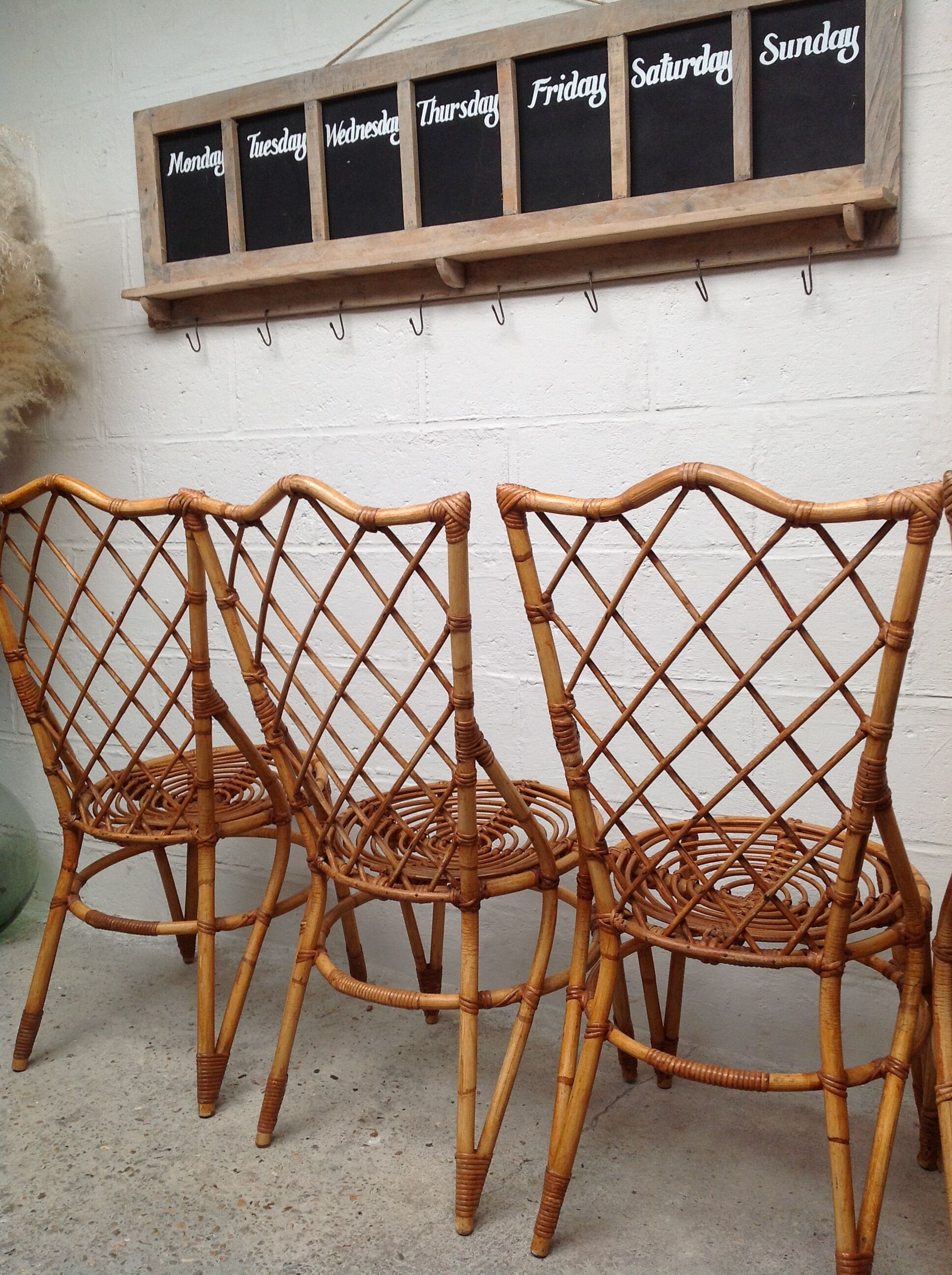 Rattan chairs by Louis Sognot