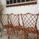 Rattan chairs by Louis Sognot