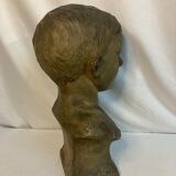 Bust of a young boy, plaster, monogrammed, circa 1900