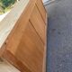 Row of renovated light solid wood chalets from the 1970s.