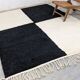 Handmade white and black beret rug