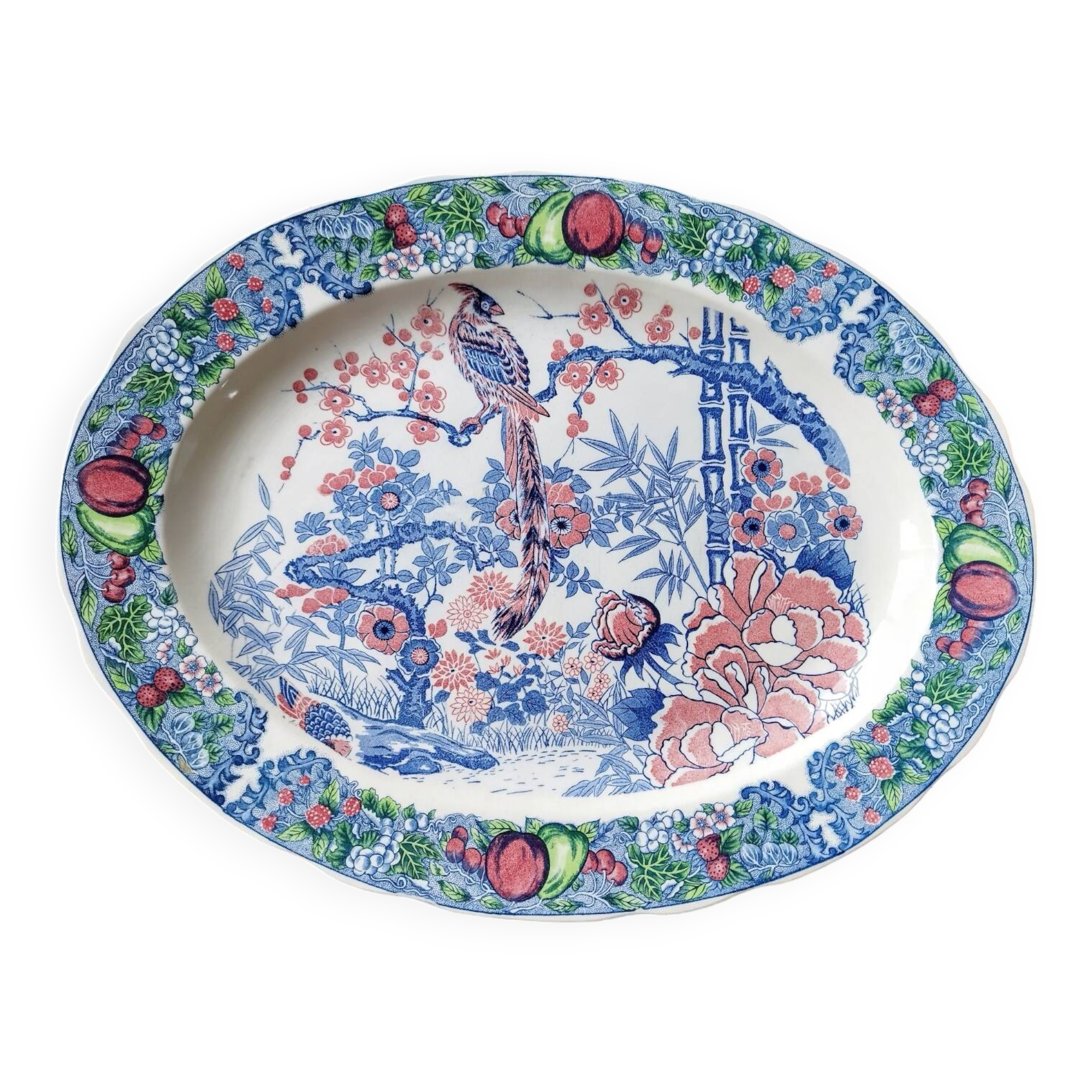 Oval Japanese plate with peacock decoration.